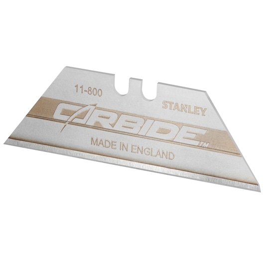 Photo of STANLEY 0-11-800 utility knife blade with carbide edge, angled view, silver and gold text, made in England.