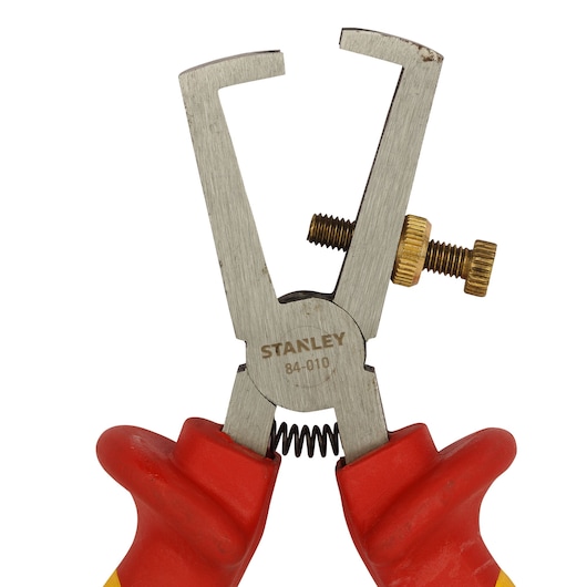 STANLEY 0-84-010 wire stripper tool with red handles, front angle on white background.