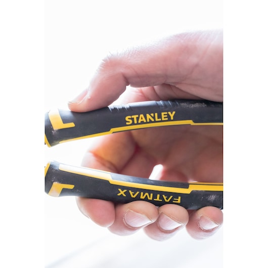 Photo of STANLEY 0-89-868 FATMAX pliers with black and yellow handles held in hand.