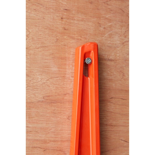 STANLEY 1-42-315 orange level tool mounted on wood, close-up photography.