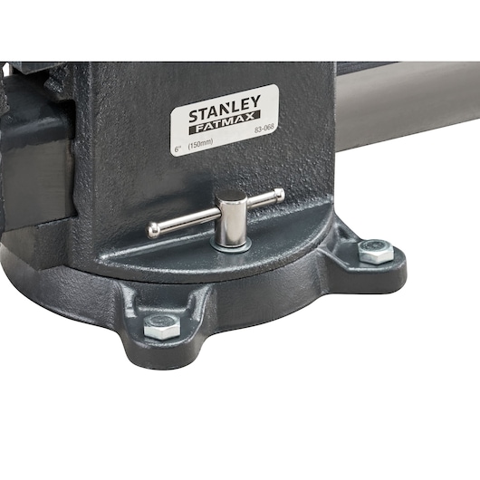 Stanley 1-83-068 bench vise base, black metal, close-up, showing bolts and adjustment handle.