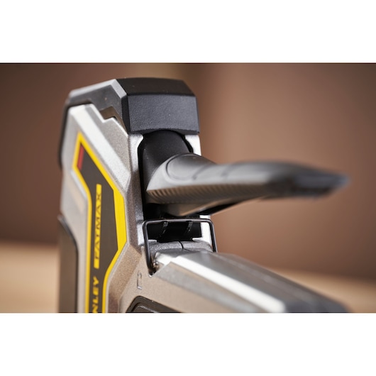 STANLEY 6-TR350 staple gun close-up, showing silver body, yellow accents, and black ergonomic handle.