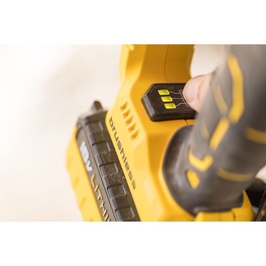 STANLEY FMCD900M2S brushless tool battery indicator close-up, yellow and black colors.