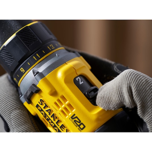 STANLEY SFMCD720D2K cordless drill close-up showing selector switch and yellow V20 FATMAX body.