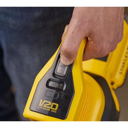 STANLEY SFMCVS001D1 handheld vacuum close-up showing yellow V20 Lithium Ion battery casing and switch