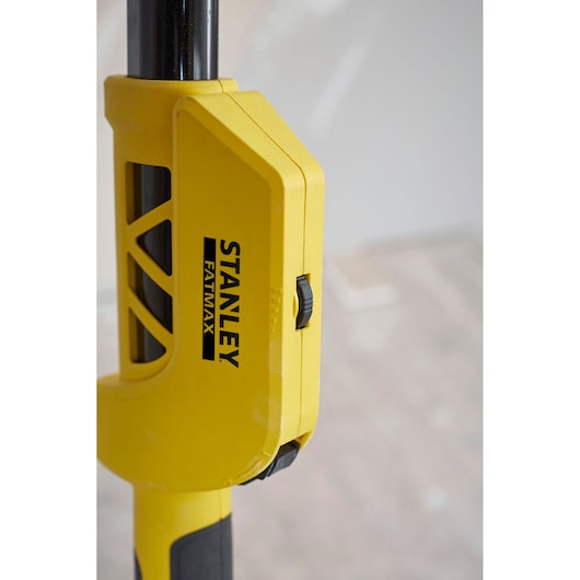 STANLEY SFMEE500S yellow pole tool detail, black adjustment knob, close-up angle.