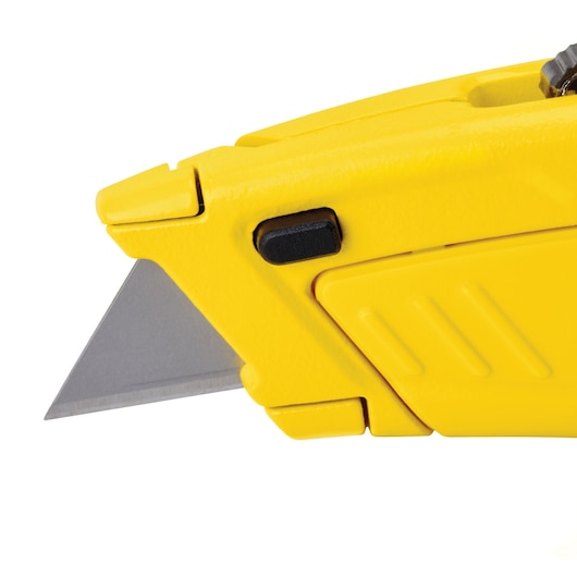 STANLEY STHT10430-0 utility knife angled view, yellow body with exposed blade and black button.