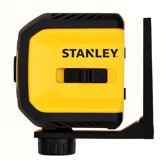 Stanley laser level side view, yellow and black casing, mounting bracket, visible lock switch, white background.