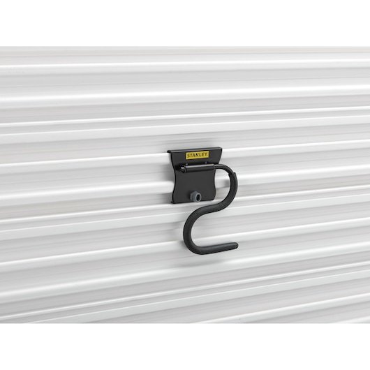 STANLEY STST82605-1 black wall hook mounted on white panel, product side angle.