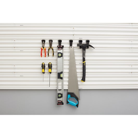 STANLEY STST82617-1 photography of garage wall panel with hand tools organized on hooks, front view.