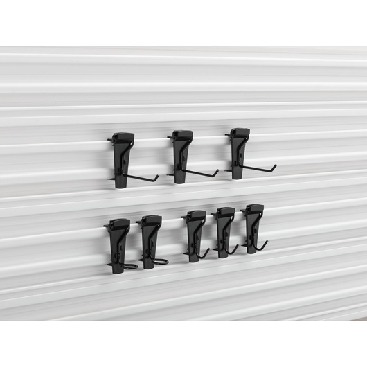 STANLEY STST82617-1 wall-mounted black hook set for tool storage, side angle on white panel.